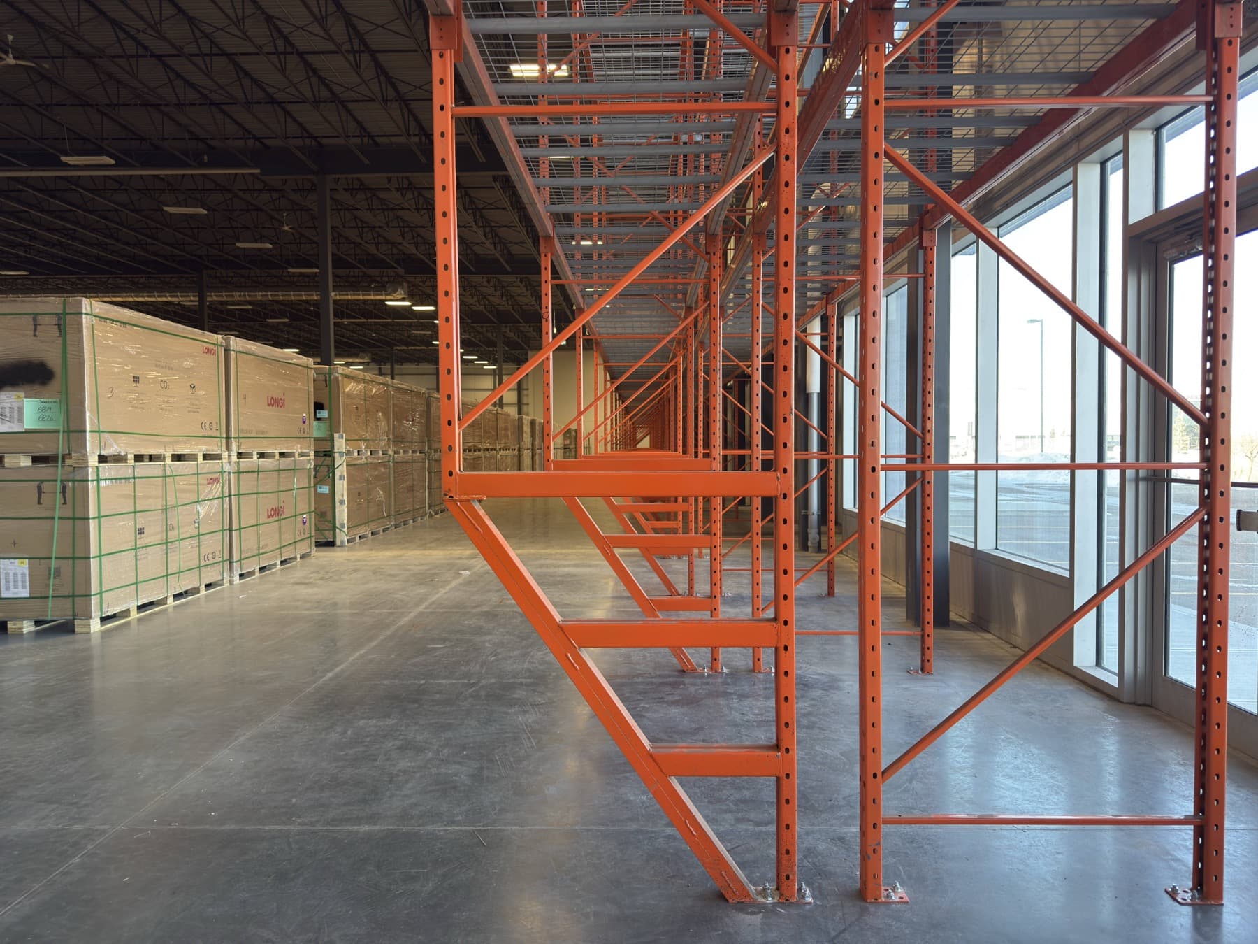Access stairs to storage racks in warehouse